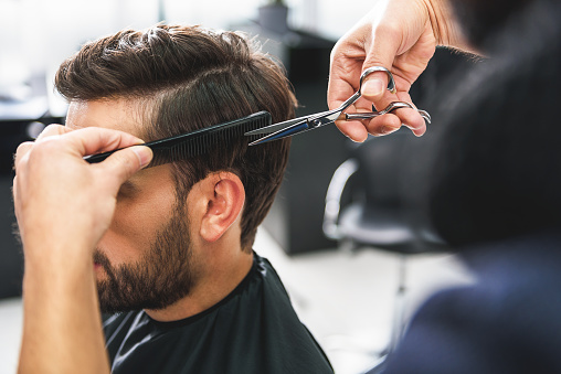 cutting over hair cut